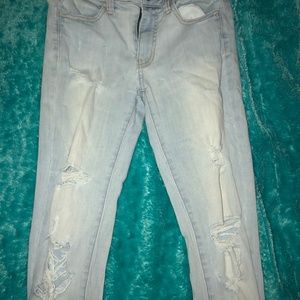 Light blue ripped jeans